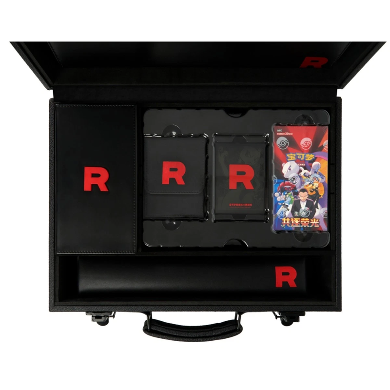 Black collector's briefcase containing sealed trading card packs and accessories with red R logo.