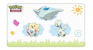 Pokémon Trading Card Game playmat featuring Lugia, Togepi, and Dragonite in a sunny field.
